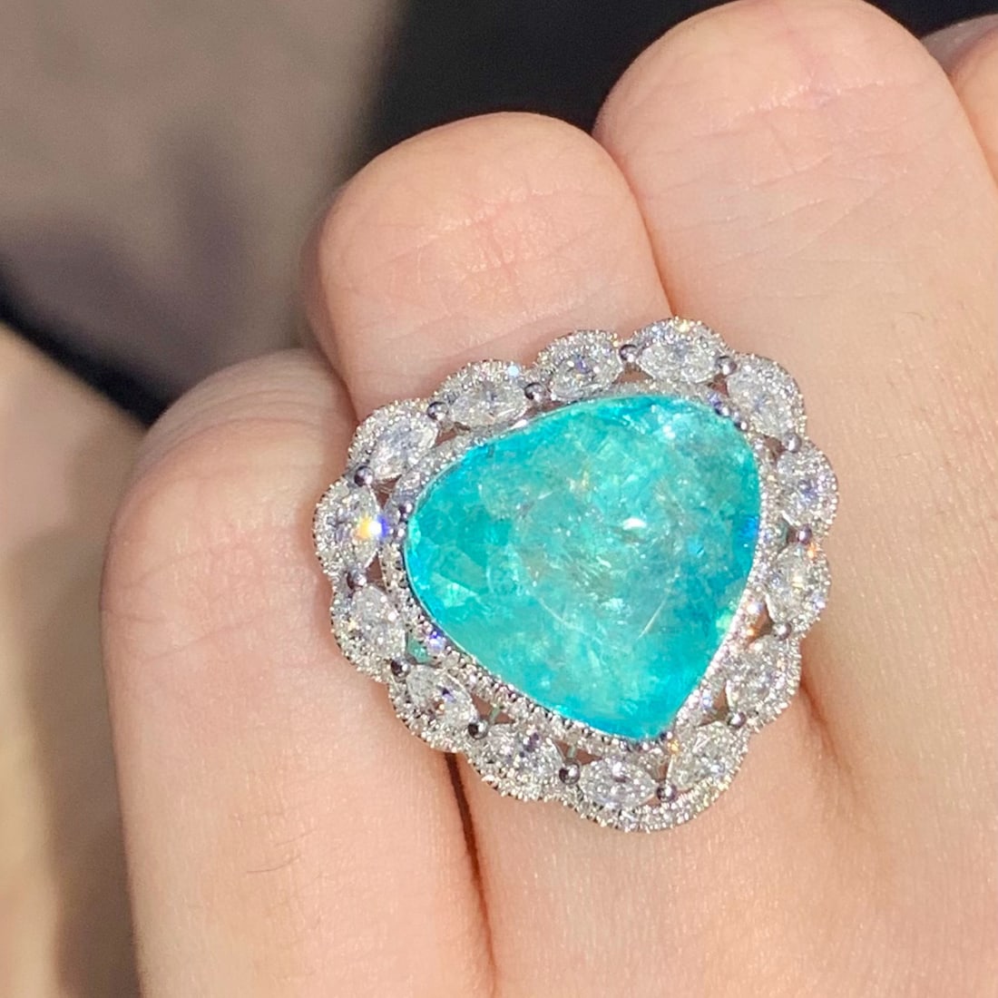 14k Gold 10.14 Ct Natural Paraiba Tourmaline & Diamond Ring: Ref:231061054 // gold content:14k gold // ring size:7. 25us // // main gemstone:paraiba tourmaline // shape:pear // carat weight:10. 14ct // color:neon blue // treatment:natural // // adjacent gemston