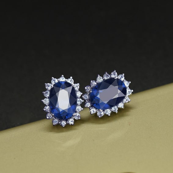 14k Gold 2.92 Ctw Natural Sapphire & Sapphire Earrings: Ref:231061070 // gold content:14k gold // main gemstone:sapphire // shape:oval // carat weight:2. 36ct // color:blue // treatment:natural // // adjacent gemstone 2 : sapphire // shape:round // carat