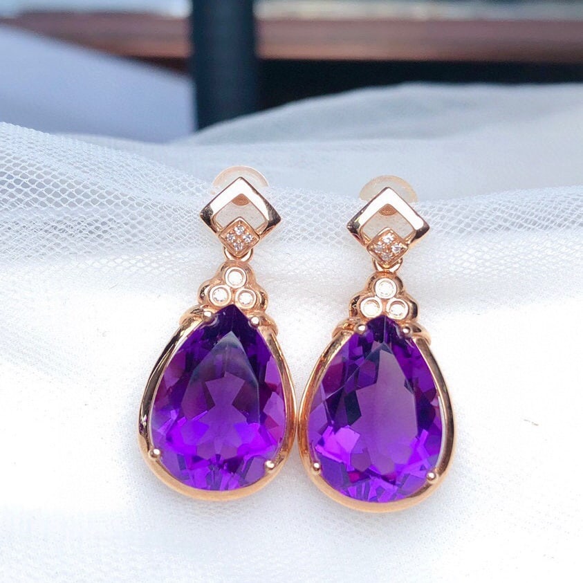 14k Gold 10.05 Ct Natural Amethyst & Diamond Earrings: Ref:231061186 // gold content:14k gold // main gemstone:amethyst // shape:pear // carat weight:10. 05ct // color:purple // treatment:natural // // adjacent gemstone 2 : diamond // number of stones:14