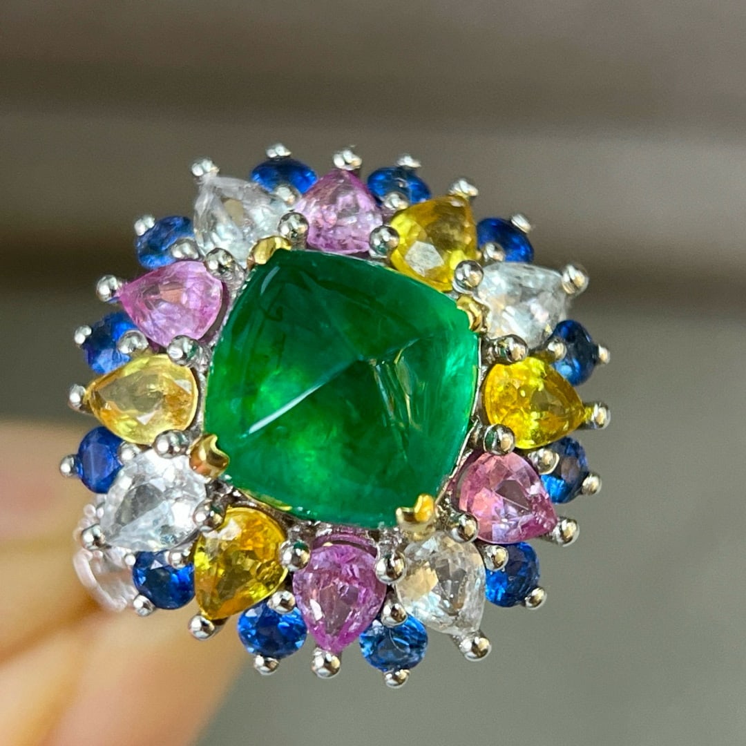 14k Gold 7.8 Ctw Natural Emerald & Sapphire Ring: Ref:231061231 // gold content:14k gold // ring size:7. 25us // // main gemstone:emerald // shape:sugar-loaf // carat weight:3. 3ct // color:green // treatment:natural // // adjacent gemstone 2 : sapph