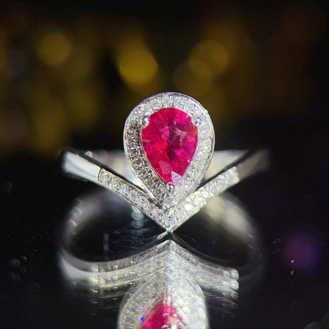 14k Gold 0.8 Ct Natural Ruby & Diamond Ring: Ref:231062027 // gold content:14k gold // ring size:7. 25us // // main gemstone:ruby // shape:pear // carat weight:0. 8ct // color:red // treatment:natural // // adjacent gemstone 2 : diamond // numbe