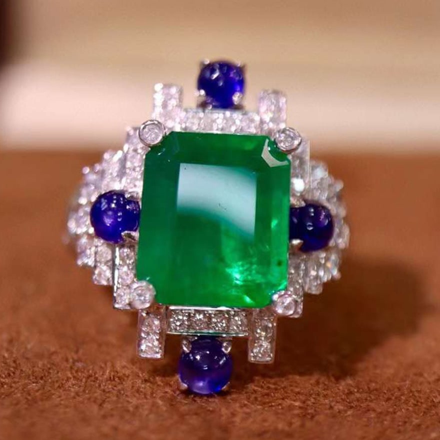 14k Gold 5.25 Ctw Vivid Green Natural Emerald & Diamond Ring: Ref:231062050 // gold content:14k gold // ring size:7. 25us // // main gemstone:emerald // shape:octagonal // carat weight:4. 80ct // color:vivid green // treatment:natural // // adjacent gemstone 2 :