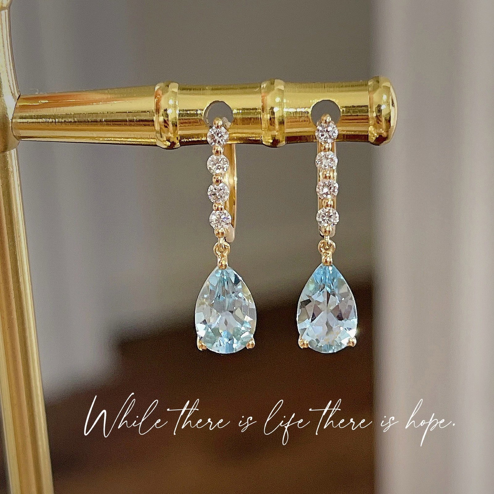 14k Gold 1.4 Ct Natural Aquamarine & Diamond Earrings: Ref:231062088 // gold content:14k gold // main gemstone:aquamarine // shape:pear // carat weight:1. 4ct // color:blue // treatment:natural // // adjacent gemstone 2 : diamond // shape:round //