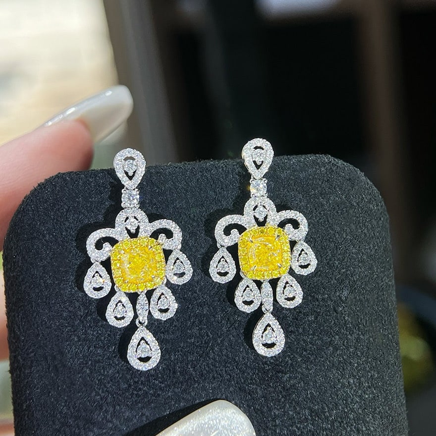 14k Gold 2.10 Ctw Natural Yellow Diamond & Diamond Earrings: Ref:231062096 // gold content:14k gold // main gemstone:yellow diamond // shape:cushion // carat weight:1. 1ct // color:yellow // treatment:natural // // adjacent gemstone 2 : diamond // shape:round