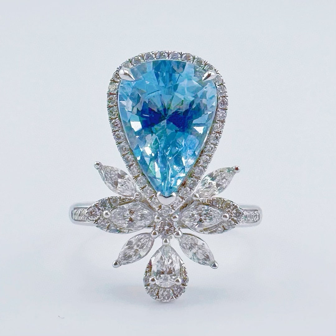 14k Gold 3.83 Ctw Natural Aquamarine & Diamond Ring: Ref:231062184 // gold content:14k gold // ring size:7. 25us // // main gemstone:aquamarine // shape:pear // carat weight:3. 19ct // color:santa maria color // treatment:natural // // adjacent