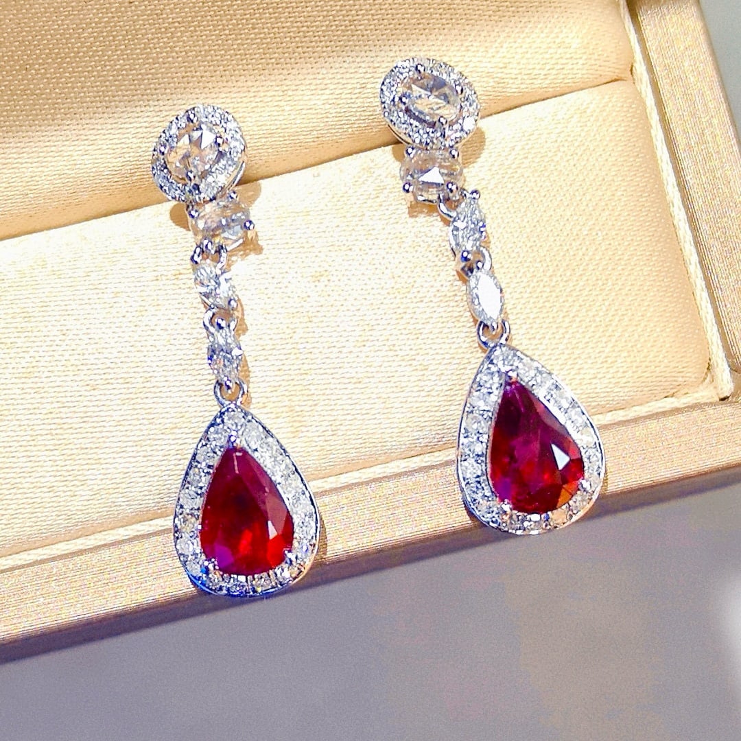 14k Gold 2.44 Ctw Natural Ruby & Diamond Earrings: Ref:231062190 // gold content:14k gold // main gemstone:ruby // shape:pear // carat weight:1. 65ct // color:pigeonblood red // treatment:natural // // adjacent gemstone 2 : diamond // shape:multiply /