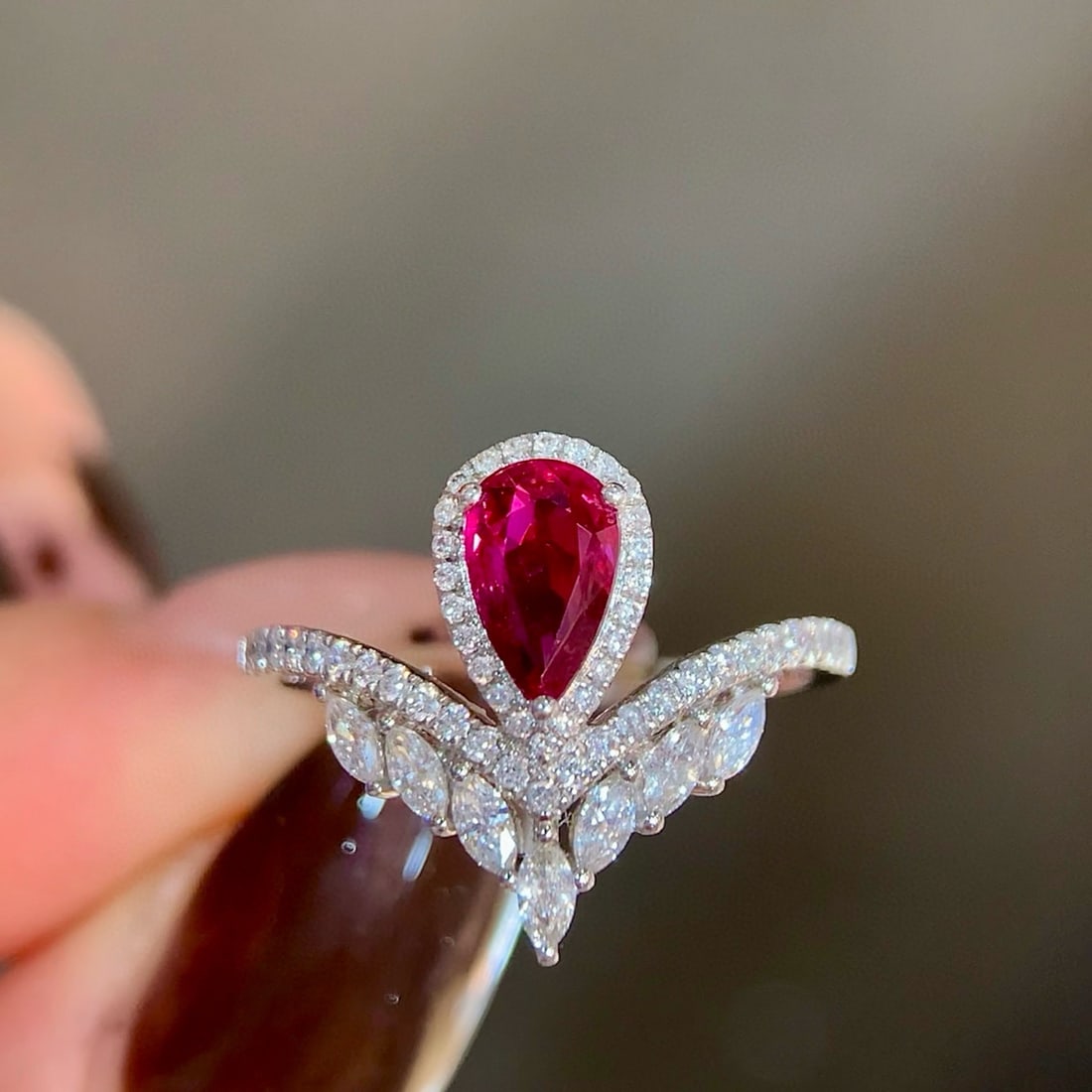 14k Gold 1.22 Ctw Natural Ruby & Diamond Ring: Ref:231062220 // gold content:14k gold // ring size:7. 25us // // main gemstone:ruby // shape:pear // carat weight:0. 82ct // color:red // treatment:natural // // adjacent gemstone 2 : diamond //
