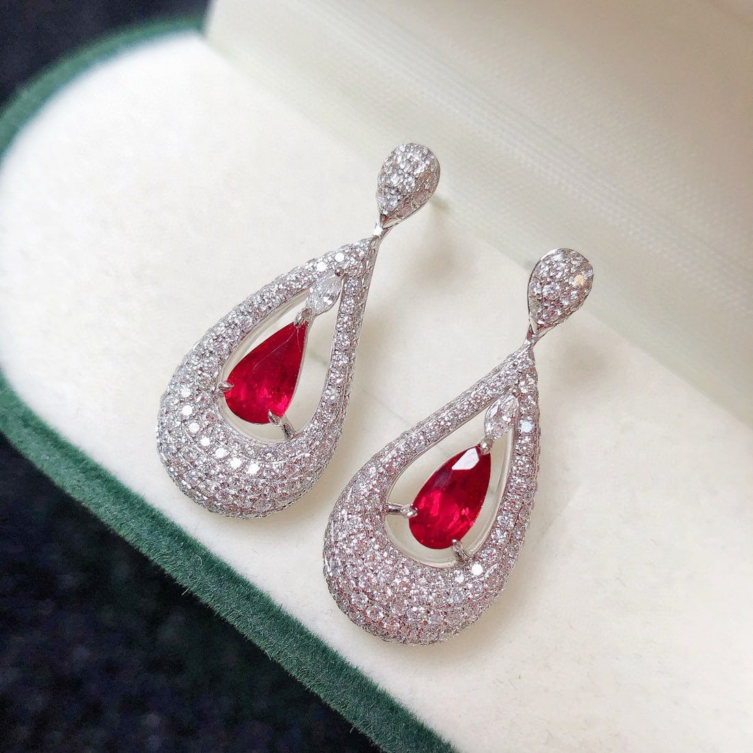 14k Gold 2.63 Ctw Natural Ruby & Diamond Earrings: Ref:231062274 // gold content:14k gold // main gemstone:ruby // shape:pear // carat weight:1. 21ct // color:pigeonblood red // treatment:natural // // adjacent gemstone 2 : diamond // shape:multiply /