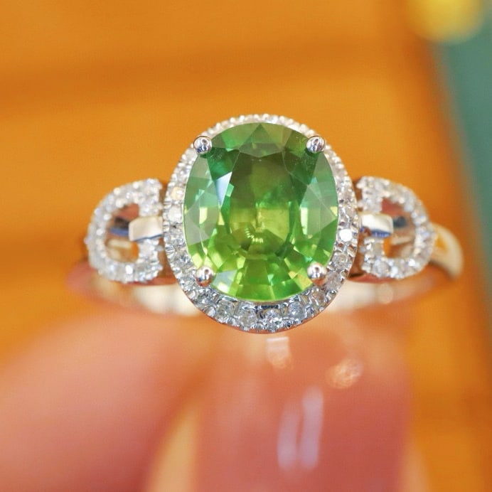 14k Gold 1.54 Ctw Natural Sapphire & Diamond Ring: Ref:231062314 // gold content:14k gold // ring size:7. 25us // // main gemstone:sapphire // shape:oval // carat weight:1. 40ct // color:green // treatment:natural // // adjacent gemstone 2 : diamond