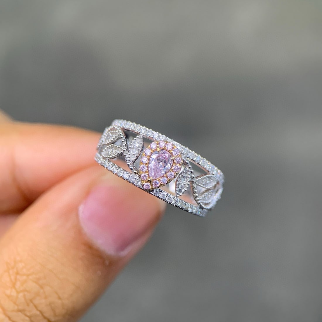14k Gold 0.55 Ctw Natural Pink Diamond & Diamond Ring: Ref:231062343 // gold content:14k gold // ring size:7. 25us // // main gemstone:pink diamond // shape:pear // carat weight:0. 21ct // color:pink // treatment:natural // // adjacent gemstone 2 : diamon