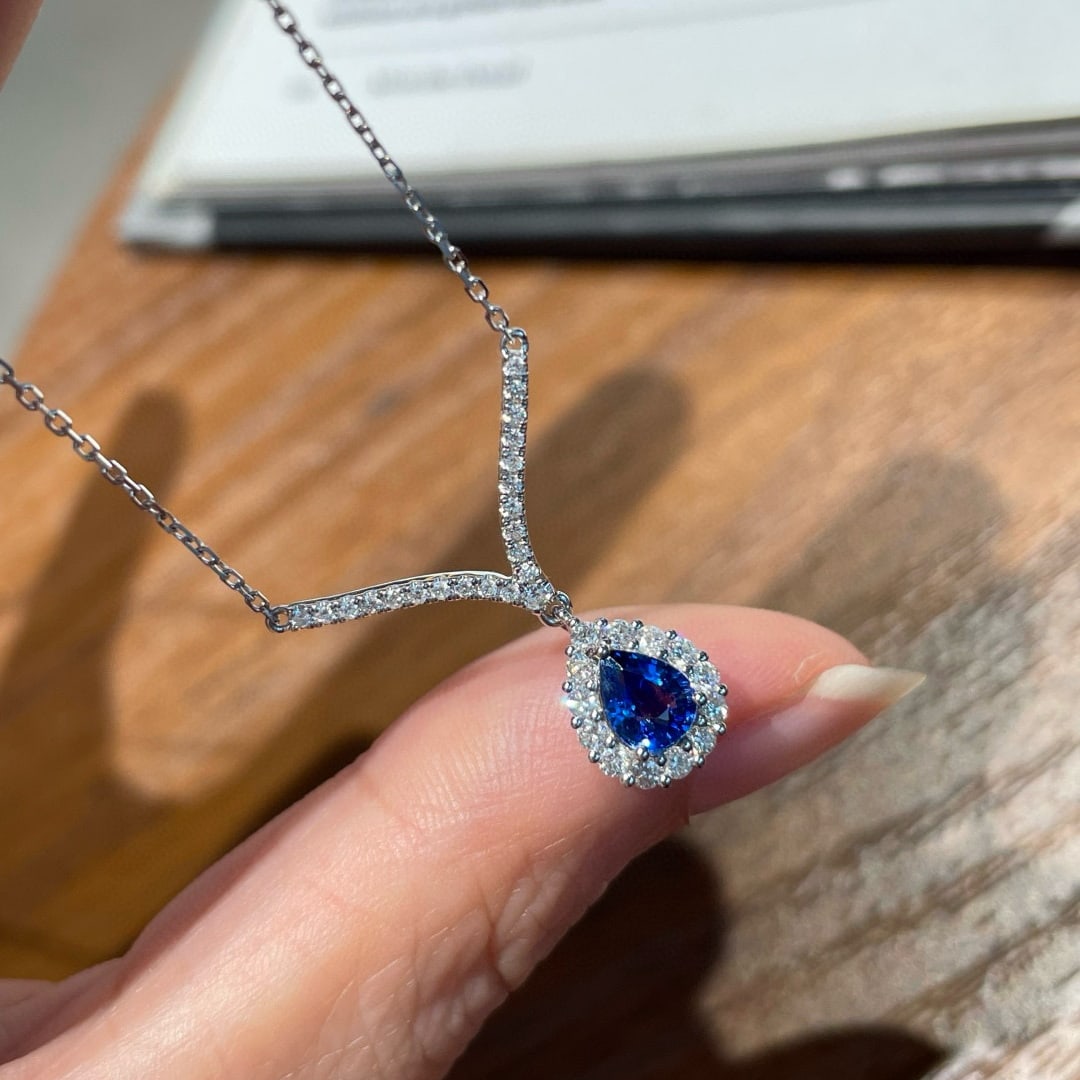 14k Gold 0.60 Ct Natural Sapphire & Diamond Necklace: Ref:231062369 // gold content:14k gold // main gemstone:sapphire // shape:pear // carat weight:0. 60ct // color:royal blue // treatment:natural // // adjacent gemstone 2 : diamond // shape:round //