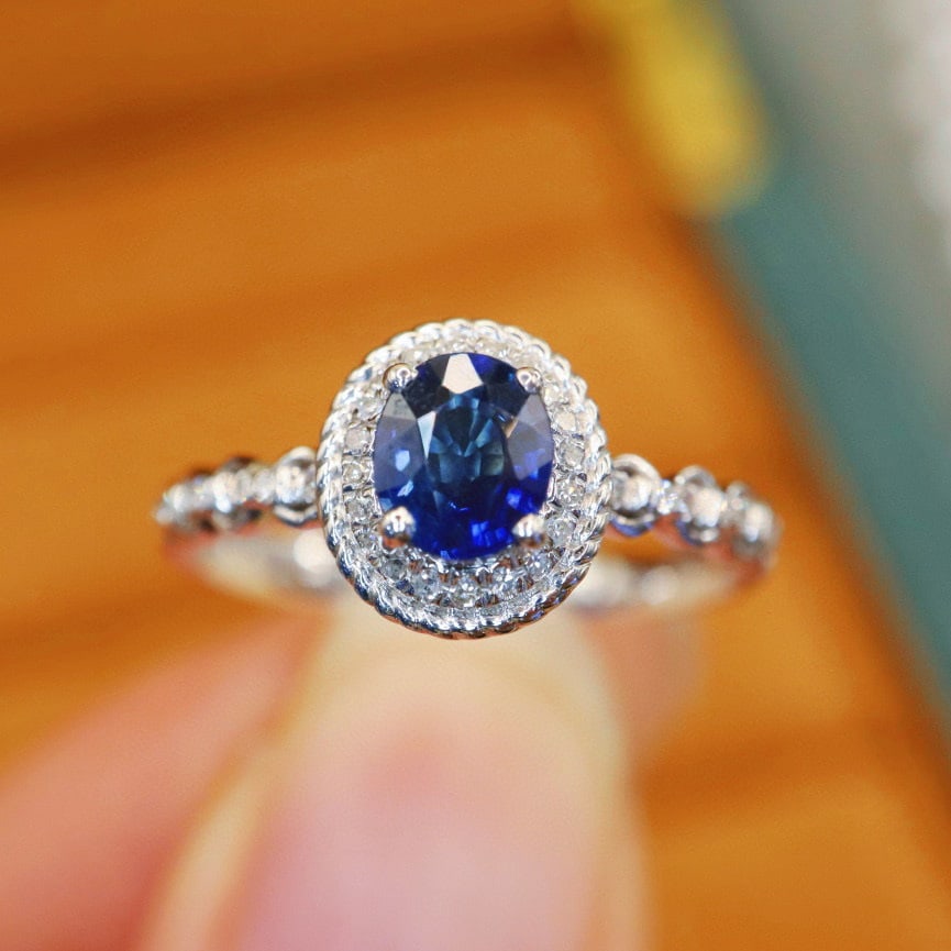14k Gold 0.75 Ctw Natural Sapphire & Diamond Ring: Ref:231062376 // gold content:14k gold // ring size:7. 25us // // main gemstone:sapphire // shape:oval // carat weight:0. 65ct // color:blue // treatment:natural // // adjacent gemstone 2 : diamond