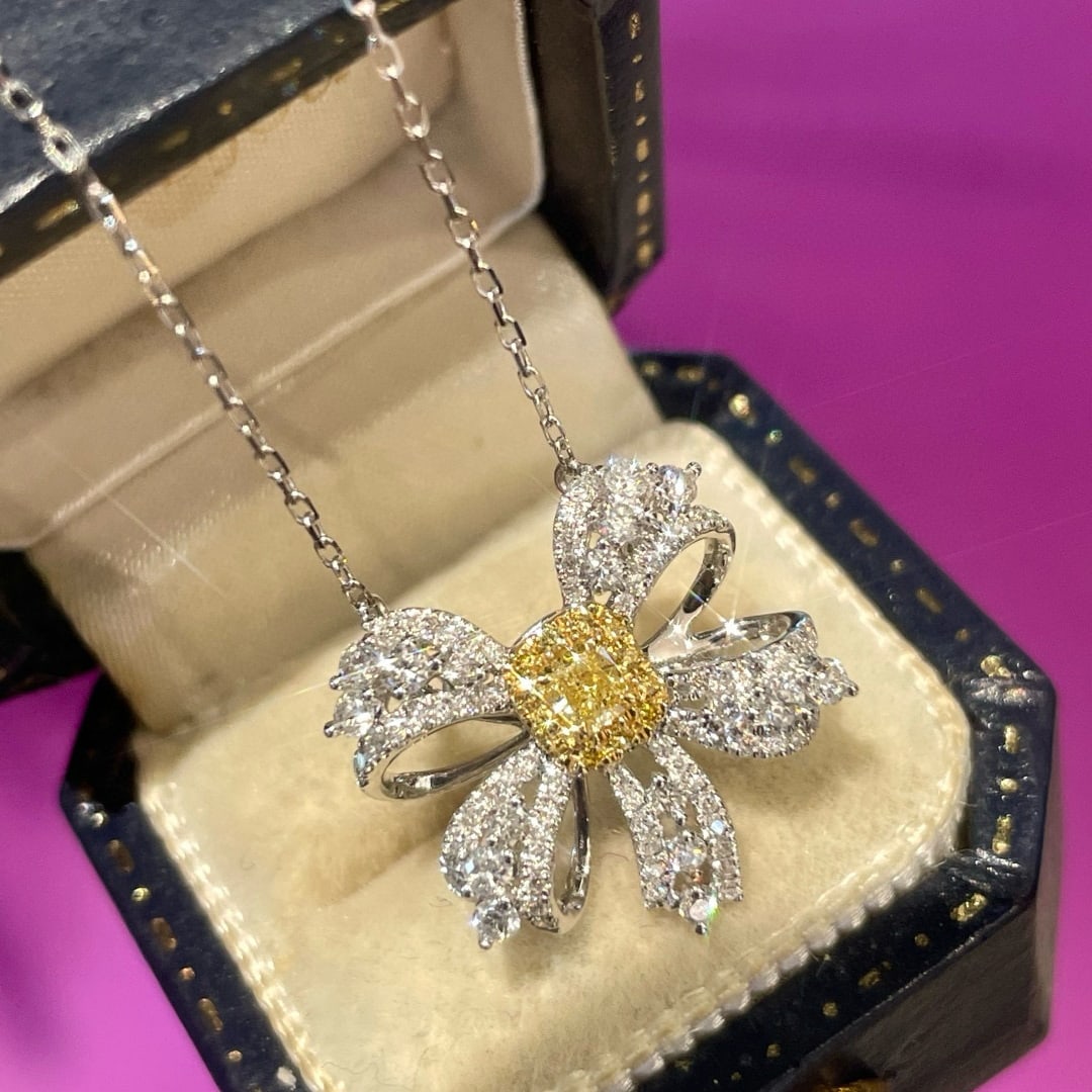 14k Gold 0.58 Ctw Natural Yellow Diamond & Diamond Necklace: Ref:231062404 // gold content:14k gold // main gemstone:yellow diamond // shape:cushion // carat weight:0. 20ct // color:yellow // treatment:natural // // adjacent gemstone 2 : diamond // shape:round