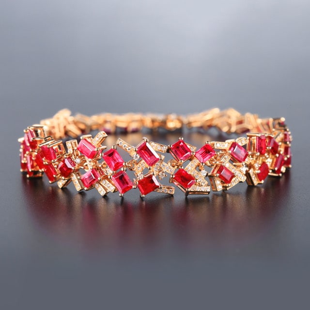 14k Gold 12.47 Ctw Natural Ruby & Diamond Bracelet: Ref:231063003 // gold content:14k gold // main gemstone:ruby // shape:octagonal // carat weight:11. 83ct // color:red // treatment:natural // // adjacent gemstone 2 : diamond // number of stones:185