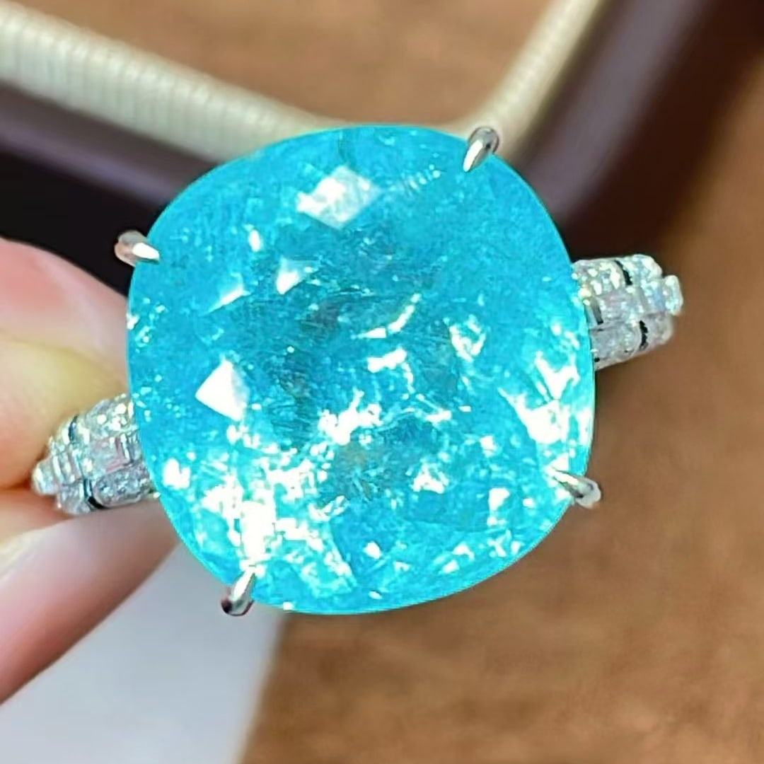 14k Gold 9.6 Ct Natural Paraiba Tourmaline & Diamond Ring: Ref:231063013 // gold content:14k gold // ring size:7. 25us // // main gemstone:paraiba tourmaline // shape:cushion // carat weight:9. 6ct // color:blue // treatment:natural // // adjacent gemstone 2 