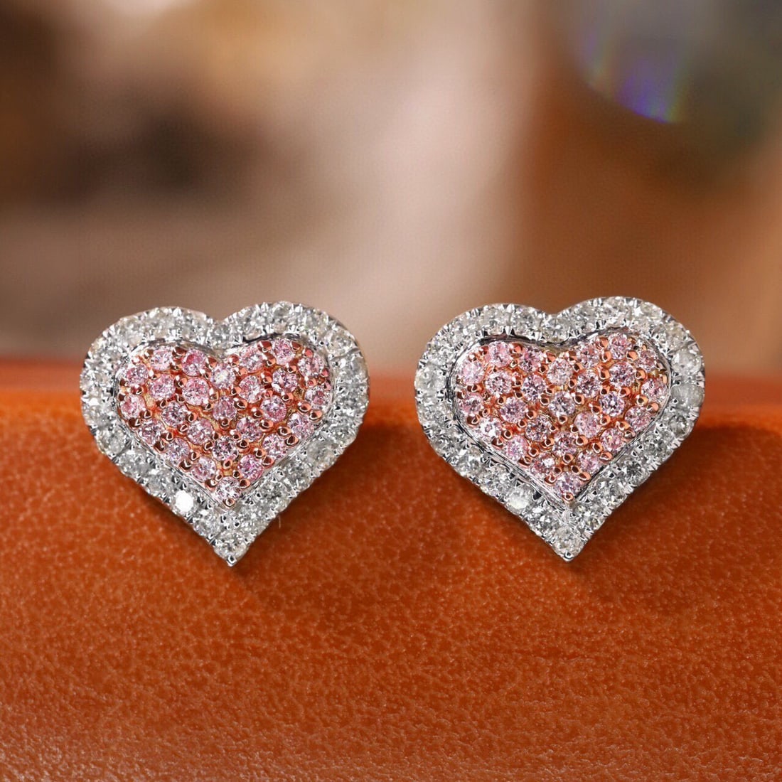14k Gold 0.80 Ct Natural Color Diamond Earrings: Ref:231063040 // gold content:14k gold // main gemstone:diamond // shape:round // carat weight:0. 80ct // clarity grade:vs-si // color:color // treatment:natural // cut grade:g // High Estimate: 5300