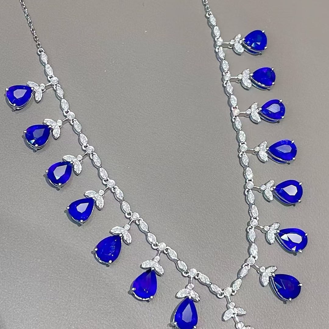 14k Gold 11 Ct Natural Sapphire & Diamond Necklace: Ref:231063064 // gold content:14k gold // main gemstone:sapphire // shape:pear // carat weight:11ct // color:royal blue // treatment:natural // // adjacent gemstone 2 : diamond // shape:round //
