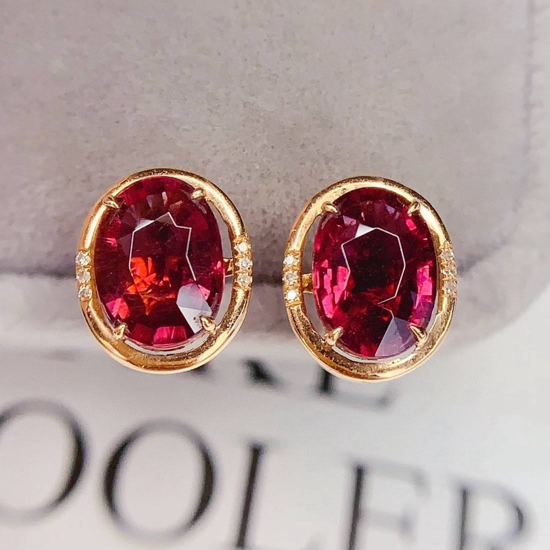 14k Gold 3.5 Ct Natural Tourmaline & Diamond Earrings: Ref:231063130 // gold content:14k gold // main gemstone:tourmaline // shape:oval // carat weight:3. 5ct // color:red // treatment:natural // // adjacent gemstone 2 : diamond // number of stones:12 //