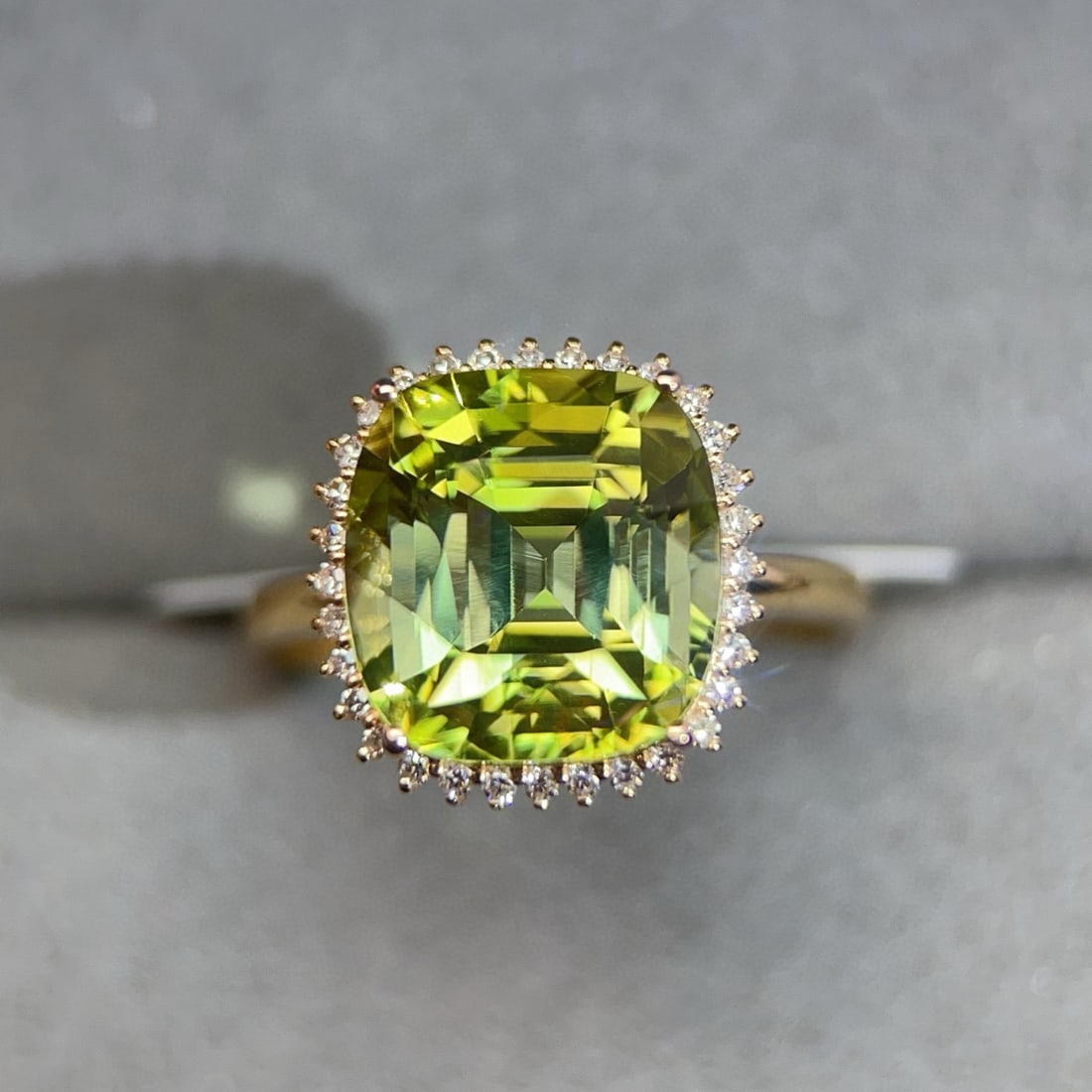 14k Gold 6.91 Ctw Natural Tourmaline & Diamond Ring: Ref:231064040 // gold content:14k gold // ring size:7. 25us // // main gemstone:tourmaline // shape:cushion // carat weight:6. 75ct // color:green // treatment:natural // // adjacent gemstone 2 :