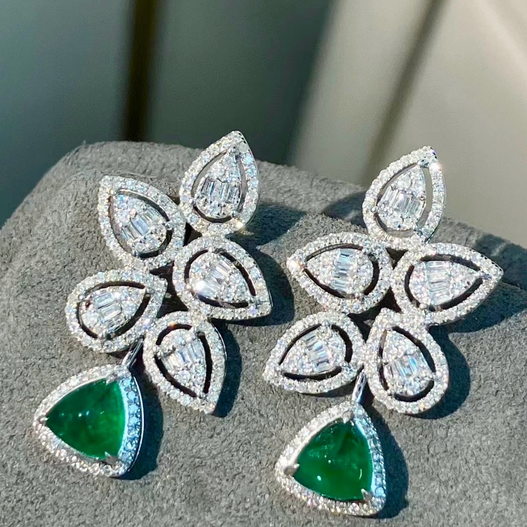 14k Gold 2.42 Ctw Vivid Green Natural Emerald & Diamond Earrings: Ref:231064068 // gold content:14k gold // main gemstone:emerald // shape:triangle // carat weight:1. 52ct // color:vivid green // treatment:natural // // adjacent gemstone 2 : diamond // shape:multipl