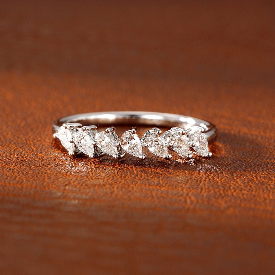 14k Gold 0.46 Ct Natural H Diamond Ring: Ref:231064081 // gold content:14k gold // ring size:7. 25us // // main gemstone:diamond // shape:pear // carat weight:0. 46ct // clarity grade:vs-si // color:h // treatment:natural // Low Estimate: 10