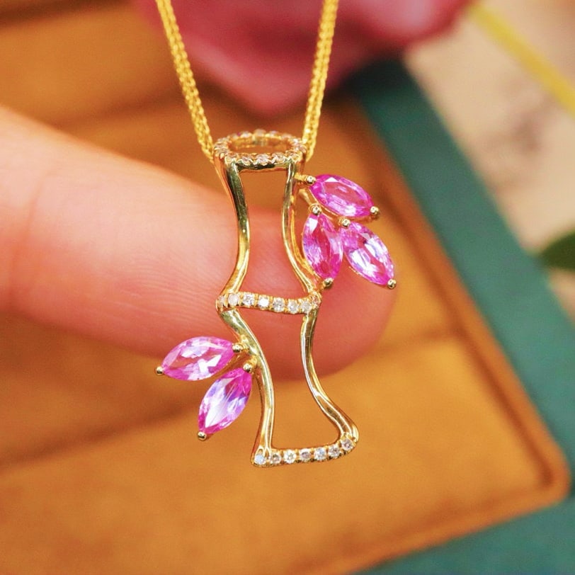 14k Gold 0.99 Ctw Natural Sapphire & Diamond Pendant( Without Chain ): Ref:231064140 // gold content:14k gold // main gemstone:sapphire // shape:marquise // carat weight:0. 90ct // color:pink // treatment:natural // // adjacent gemstone 2 : diamond // number of