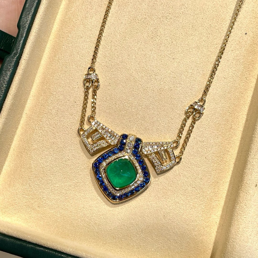 14k Gold 4.08 Ct Vivid Green Natural Emerald & Sapphire & Diamond Necklace: Ref:231064162 // gold content:14k gold // main gemstone:emerald // shape:sugar-loaf // carat weight:4. 08ct // color:vivid green // treatment:natural // // adjacent gemstone 2 : sapphire // shape:roun