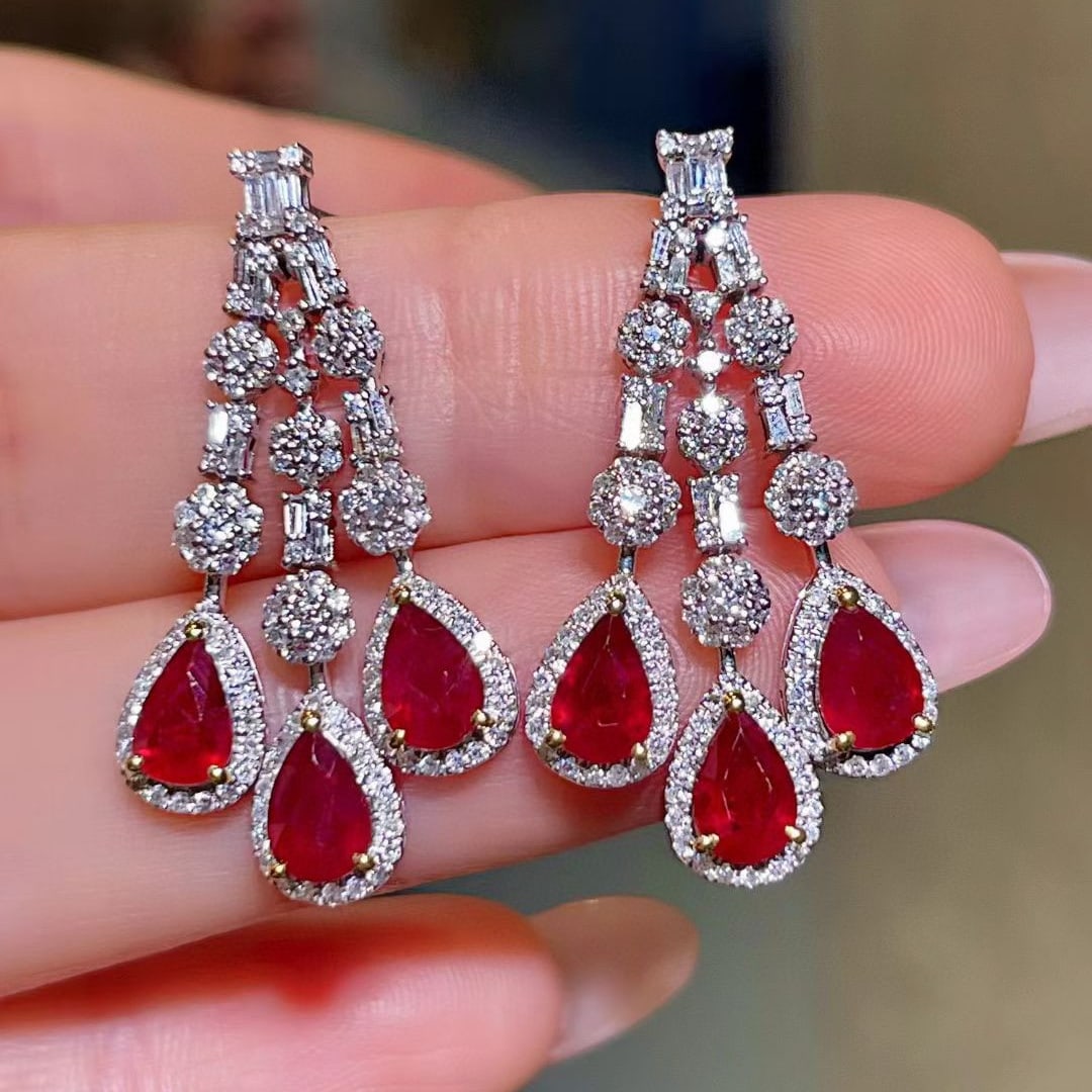 14k Gold 4.14 Ctw Natural Ruby & Diamond Earrings: Ref:231064191 // gold content:14k gold // main gemstone:ruby // shape:pear // carat weight:3. 12ct // color:pigeonblood red // treatment:natural // // adjacent gemstone 2 : diamond // shape:multiply /