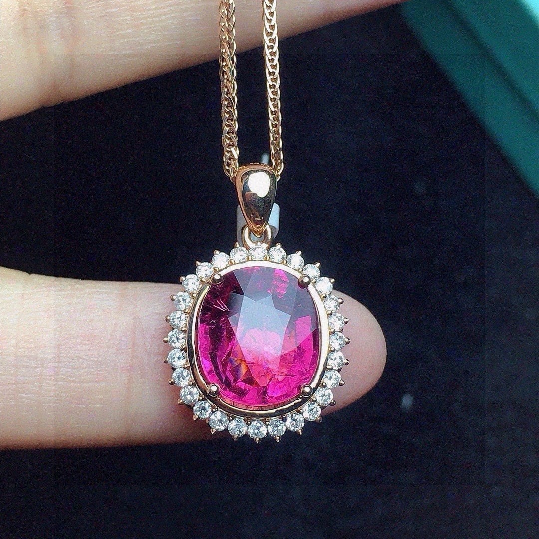 14k Gold 3.33 Ct Natural Tourmaline & Diamond Pendant( Without Chain ): Ref:231064215 // gold content:14k gold // main gemstone:tourmaline // shape:oval // carat weight:3. 33ct // color:red // treatment:natural // // adjacent gemstone 2 : diamond // number of stones:28