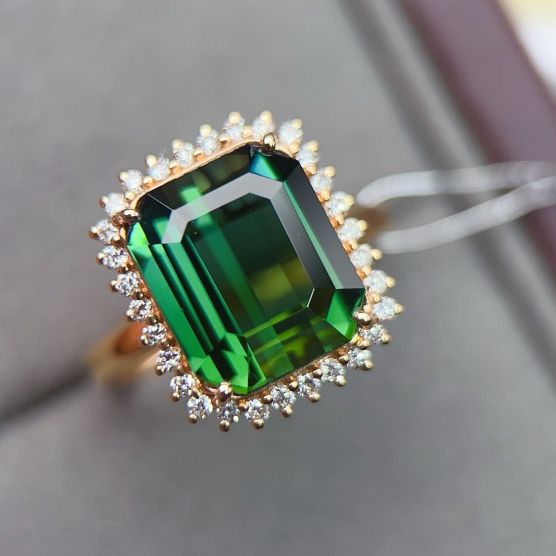 14k Gold 5.35 Ctw Natural Tourmaline & Diamond Ring: Ref:231064228 // gold content:14k gold // ring size:7. 25us // // main gemstone:tourmaline // shape:octagonal // carat weight:5. 05ct // color:green // treatment:natural // // adjacent gemstone 2 :