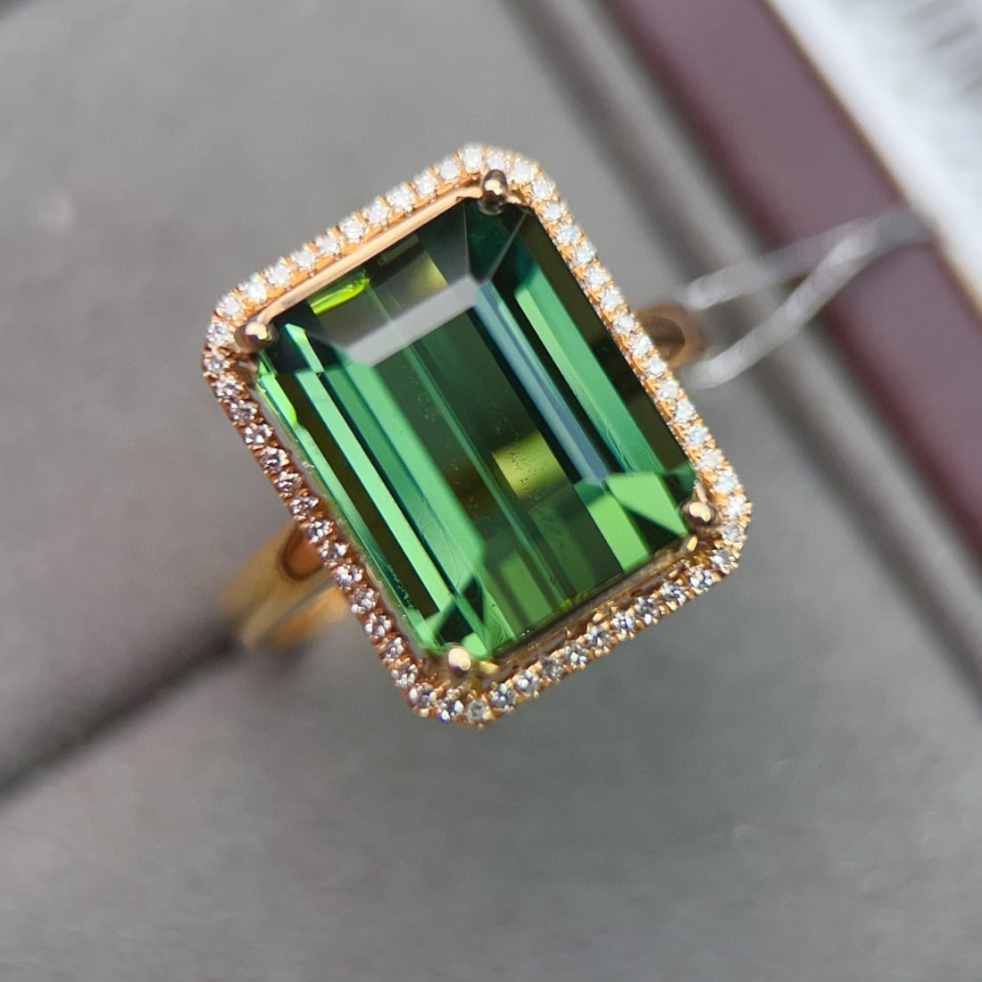 14k Gold 9.02 Ctw Natural Tourmaline & Diamond Ring: Ref:231064312 // gold content:14k gold // ring size:7. 25us // // main gemstone:tourmaline // shape:octagonal // carat weight:8. 85ct // color:green // treatment:natural // // adjacent gemstone 2 :