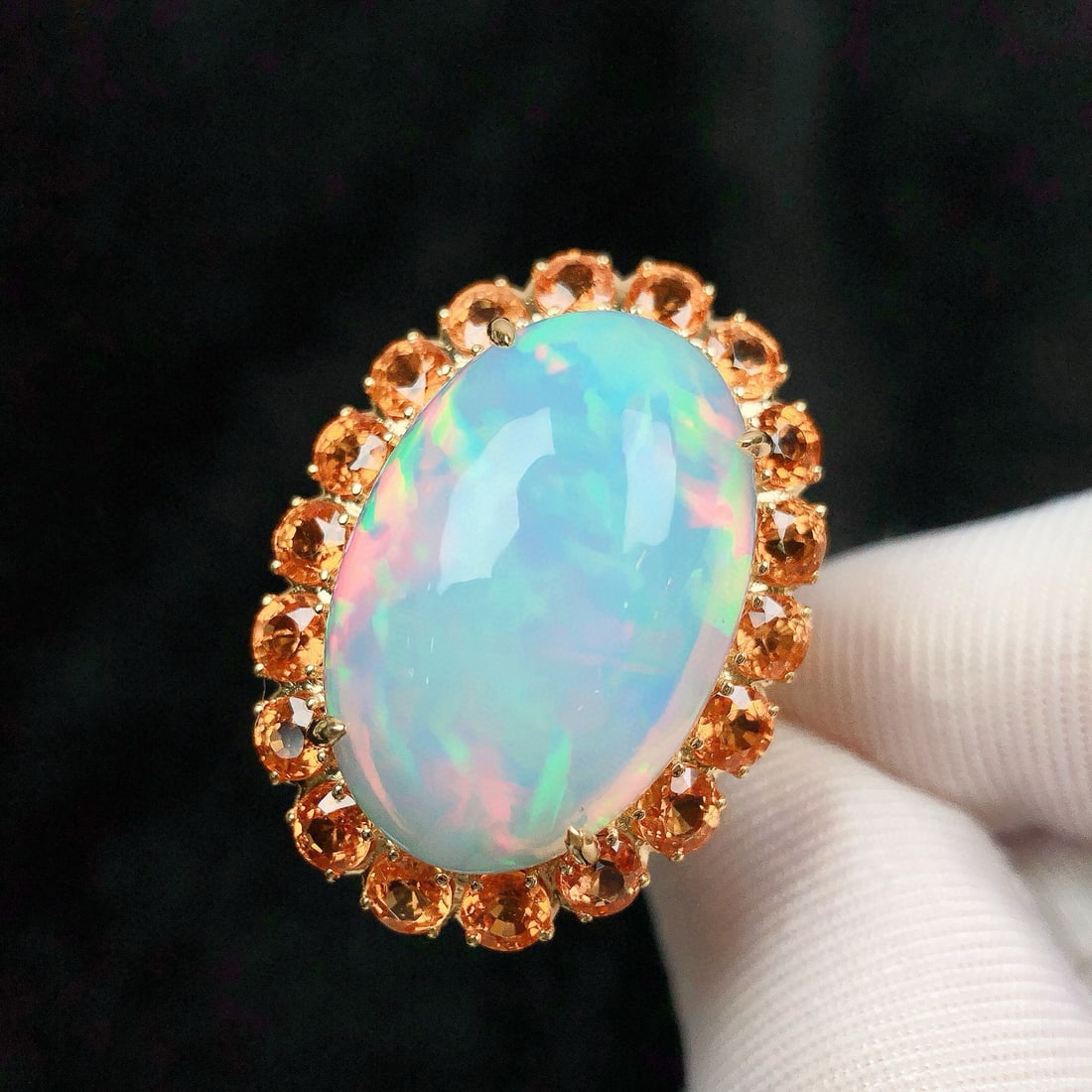14k Gold 15.03 Ctw Natural Opal & Sapphire Ring: Ref:231064431 // gold content:14k gold // ring size:7. 25us // // main gemstone:opal // shape:oval // carat weight:10. 28ct // color:color // treatment:natural // // adjacent gemstone 2 : sapphire // 