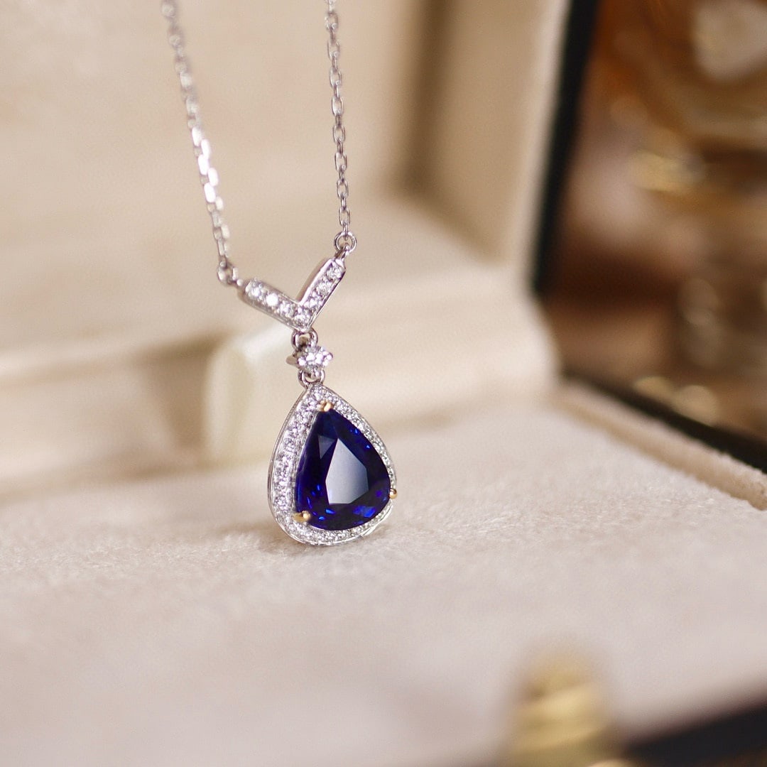14k Gold 1.99 Ctw Natural Sapphire & Diamond Necklace: Ref:231064445 // gold content:14k gold // main gemstone:sapphire // shape:pear // carat weight:1. 77ct // color:royal blue // treatment:natural // // adjacent gemstone 2 : diamond // shape:round //