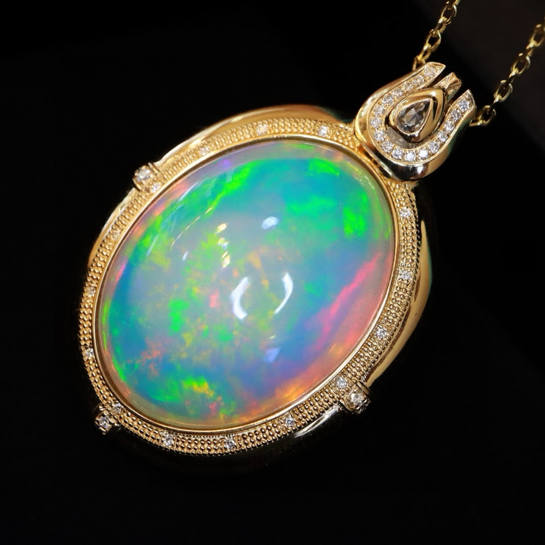 14k Gold 26.23 Ctw Natural Opal & Diamond Pendant( Without Chain ): Ref:231065035 // gold content:14k gold // main gemstone:opal // shape:oval // carat weight:26. 06ct // color:color // treatment:natural // // adjacent gemstone 2 : diamond // shape:round // carat