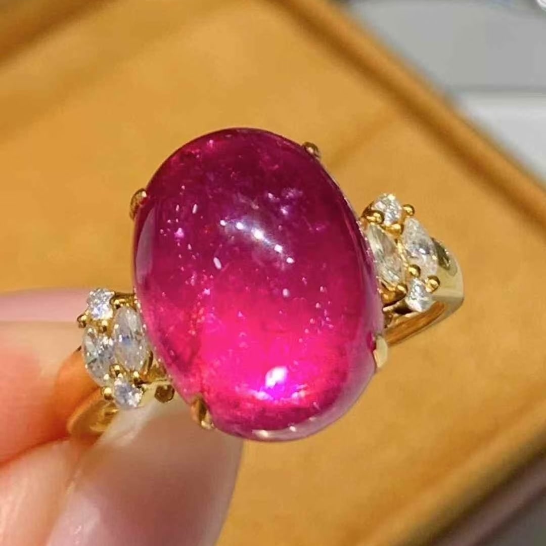 14k Gold 8.65 Ct Natural Tourmaline & Diamond Ring: Ref:231065087 // gold content:14k gold // ring size:7. 25us // // main gemstone:tourmaline // shape:oval // carat weight:8. 65ct // color:red // treatment:natural // // adjacent gemstone 2 : diamond