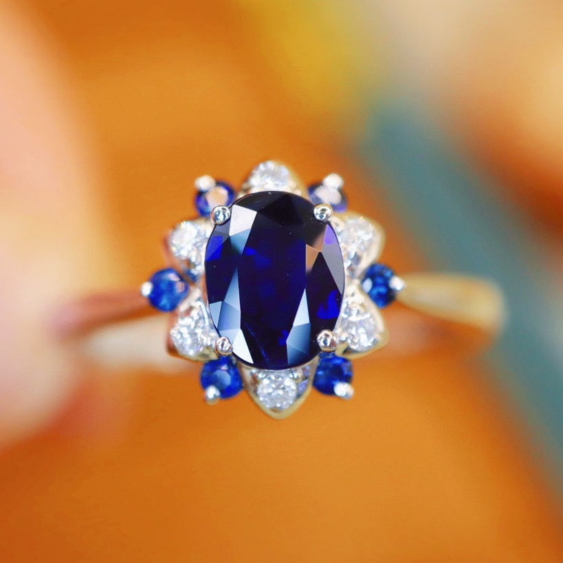 14k Gold 0.74 Ctw Natural Sapphire & Diamond Ring: Ref:231065104 // gold content:14k gold // ring size:7. 25us // // main gemstone:sapphire // shape:oval // carat weight:0. 68ct // color:royal blue // treatment:natural // // adjacent gemstone 2 : diam