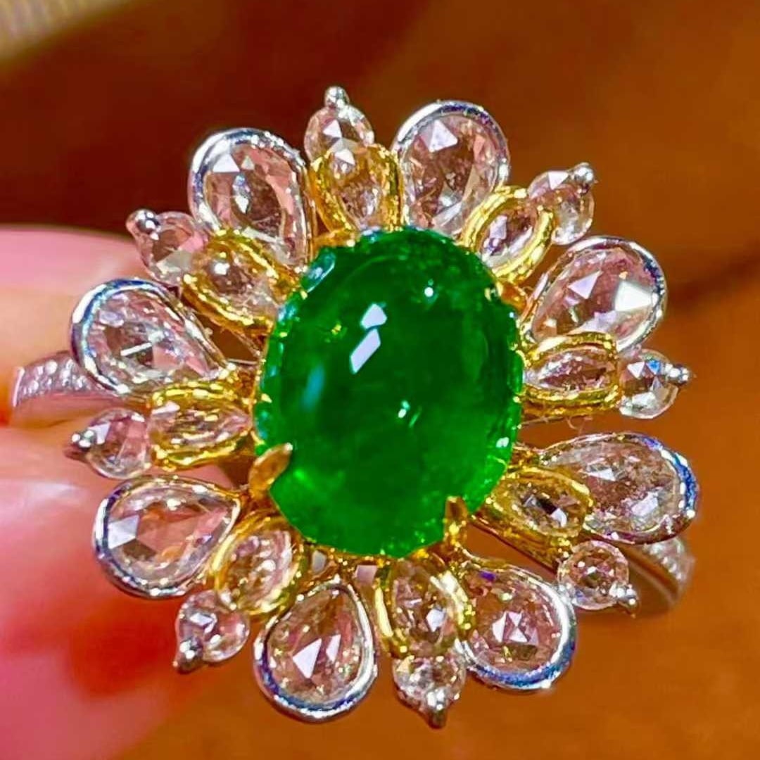 14k Gold 2.82 Ctw Vivid Green Natural Emerald & Sapphire Ring: Ref:231065136 // gold content:14k gold // ring size:7. 25us // // main gemstone:emerald // shape:oval // carat weight:1. 7ct // color:vivid green // treatment:natural // // adjacent gemstone 2 :