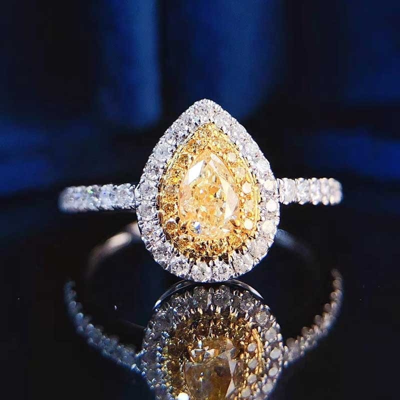 14k Gold 0.65 Ctw Natural Yellow Diamond & Diamond Ring: Ref:231065151 // gold content:14k gold // ring size:7. 25us // // main gemstone:yellow diamond // shape:pear // carat weight:0. 30ct // color:yellow // treatment:natural // // adjacent gemstone 2 :