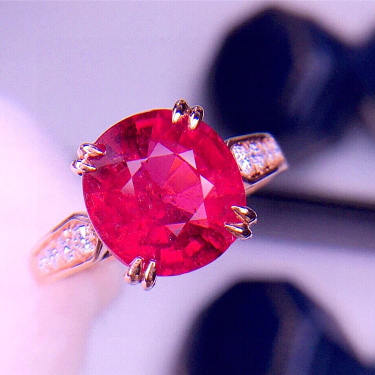 14k Gold 3.95 Ct Natural Tourmaline & Diamond Ring: Ref:231065201 // gold content:14k gold // ring size:7. 25us // // main gemstone:tourmaline // shape:oval // carat weight:3. 95ct // color:red // treatment:natural // // adjacent gemstone 2 : diamond