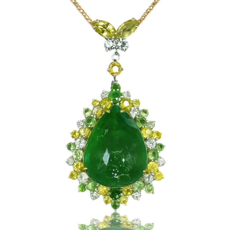 14k Gold 9.87 Ctw Vivid Green Natural Emerald & Sapphire Pendant( Without Chain ): Ref:231065214 // gold content:14k gold // main gemstone:emerald // shape:pear // carat weight:8. 58ct // color:vivid green // treatment:natural // // adjacent gemstone 2 : sapphire // shape:multiple