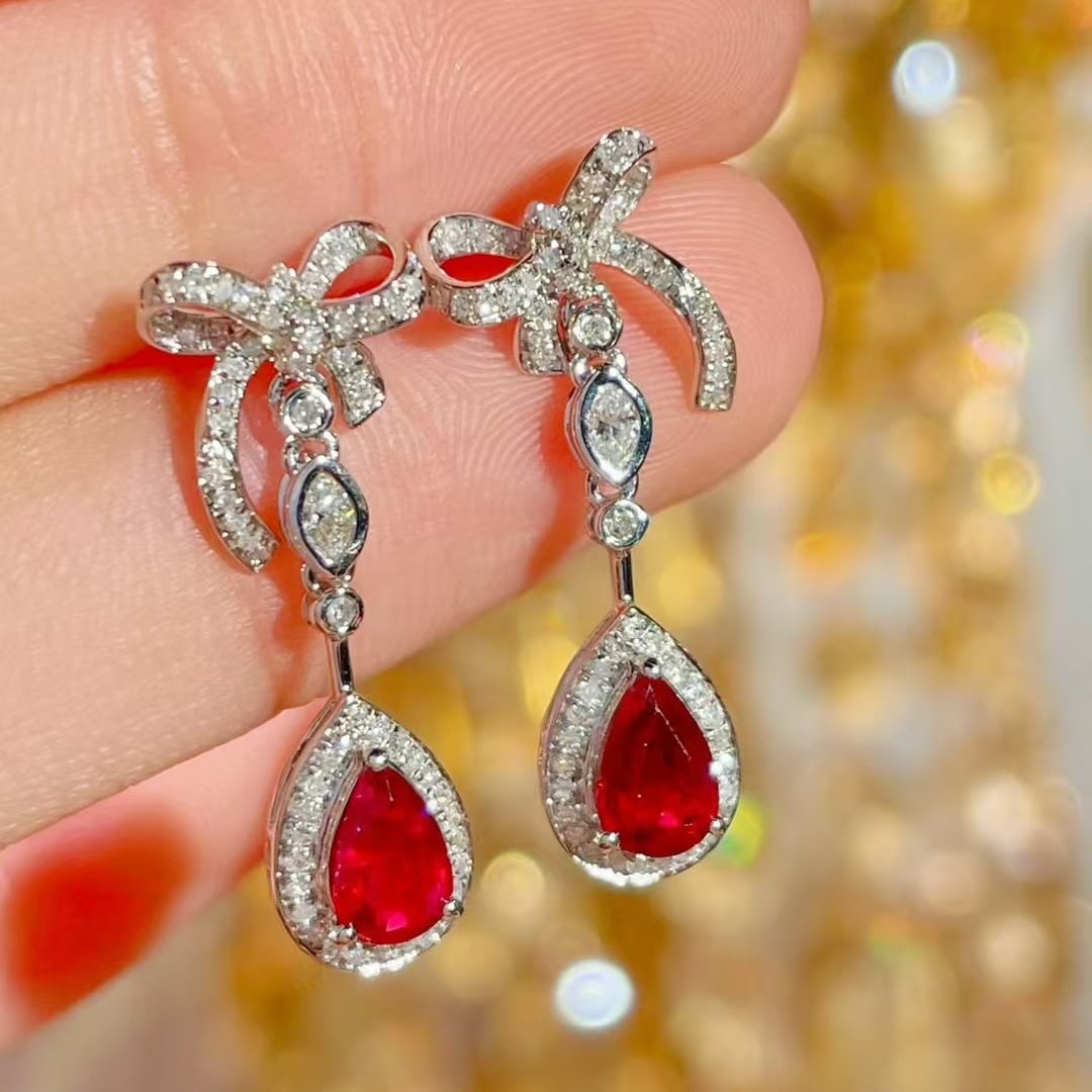 14k Gold 1.08 Ct Natural Ruby & Diamond Earrings: Ref:231065218 // gold content:14k gold // main gemstone:ruby // shape:pear // carat weight:1. 08ct // color:pigeonblood red // treatment:natural // // adjacent gemstone 2 : diamond // shape:round //