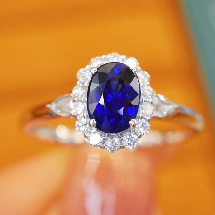 14k Gold 1.07 Ctw Natural Sapphire & Diamond Ring: Ref:231066152 // gold content:14k gold // ring size:7. 25us // // main gemstone:sapphire // shape:oval // carat weight:0. 86ct // color:royal blue // treatment:natural // // adjacent gemstone 2 :