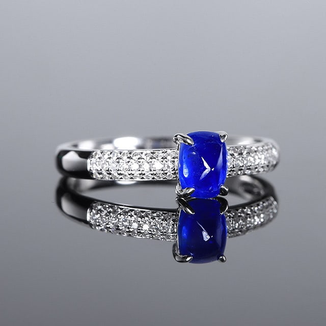 14k Gold 0.99 Ctw Natural Sapphire & Diamond Ring: Ref:231066195 // gold content:14k gold // ring size:7. 25us // // main gemstone:sapphire // shape:sugar-loaf // carat weight:0. 85ct // color:royal blue // treatment:natural // // adjacent gemstone 2