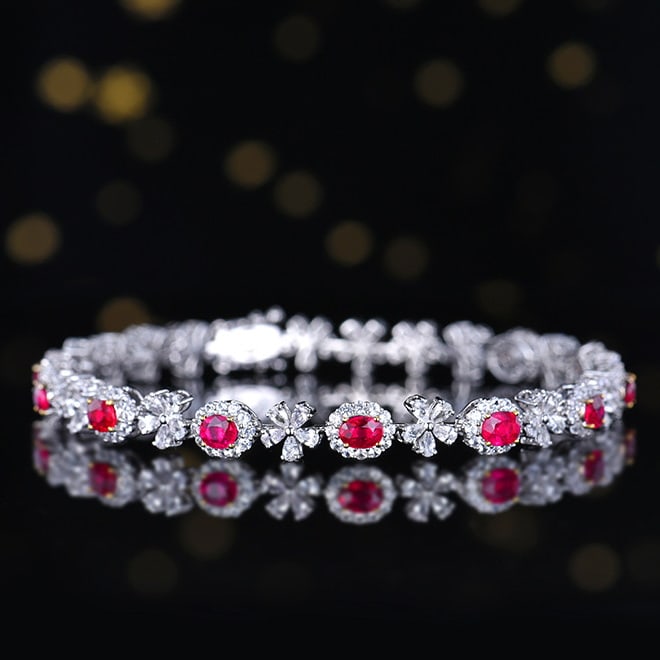 14k Gold 5.72 Ctw Natural Ruby & Sapphire Bracelet: Ref:231066234 // gold content:14k gold // main gemstone:ruby // shape:oval // carat weight:1. 9ct // color:red // treatment:natural // // adjacent gemstone 2 : sapphire // number of stones:120 //