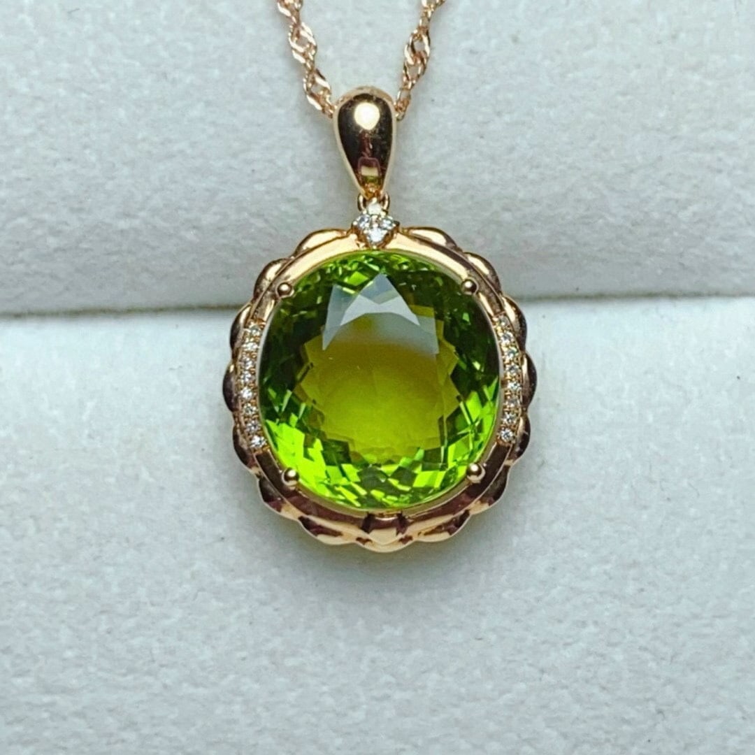 14k Gold 11.32 Ctw Natural Tourmaline & Diamond Pendant( Without Chain ): Ref:231066253 // gold content:14k gold // main gemstone:tourmaline // shape:oval // carat weight:11. 25ct // color:green // treatment:natural // // adjacent gemstone 2 : diamond // number of