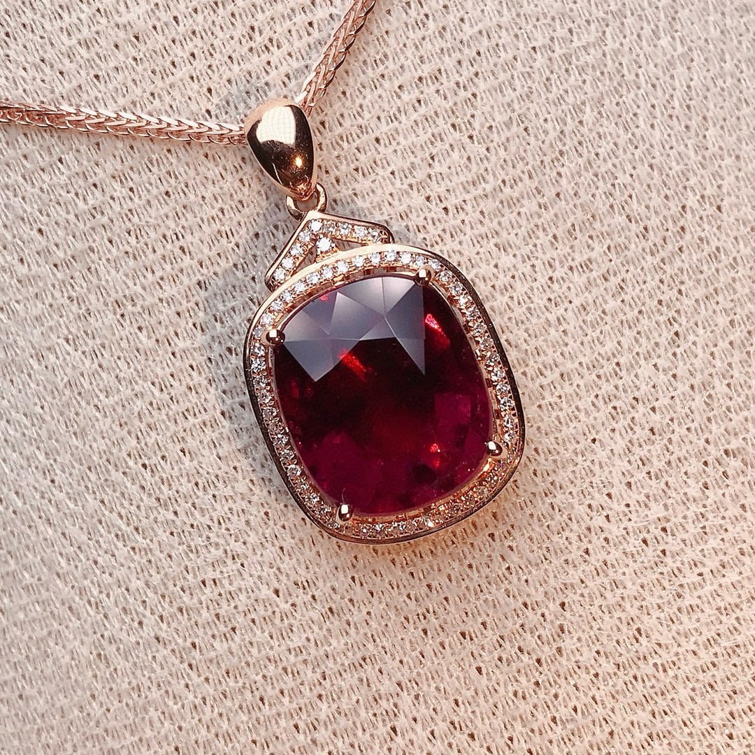14k Gold 7.2 Ct Natural Tourmaline & Diamond Pendant( Without Chain ): Ref:231066268 // gold content:14k gold // main gemstone:tourmaline // shape:cushion // carat weight:7. 2ct // color:red // treatment:natural // // adjacent gemstone 2 : diamond // number of stones:62