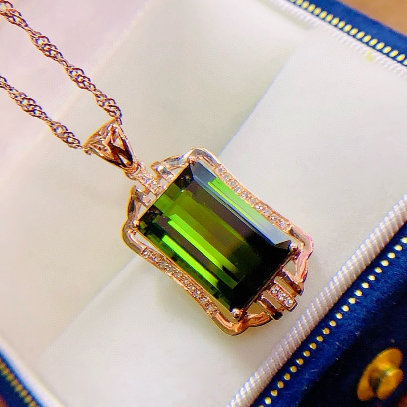 14k Gold 7.93 Ctw Natural Tourmaline & Diamond Pendant( Without Chain ): Ref:231066269 // gold content:14k gold // main gemstone:tourmaline // shape:octagonal // carat weight:7. 85ct // color:green // treatment:natural // // adjacent gemstone 2 : diamond // number of