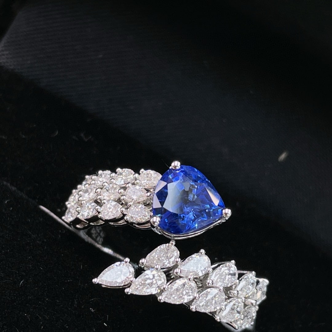 14k Gold 2.98 Ctw Natural Sapphire & Diamond Ring: Ref:231066301 // gold content:14k gold // ring size:7. 25us // // main gemstone:sapphire // shape:pear // carat weight:1. 75ct // color:blue // treatment:natural // // adjacent gemstone 2 : diamond