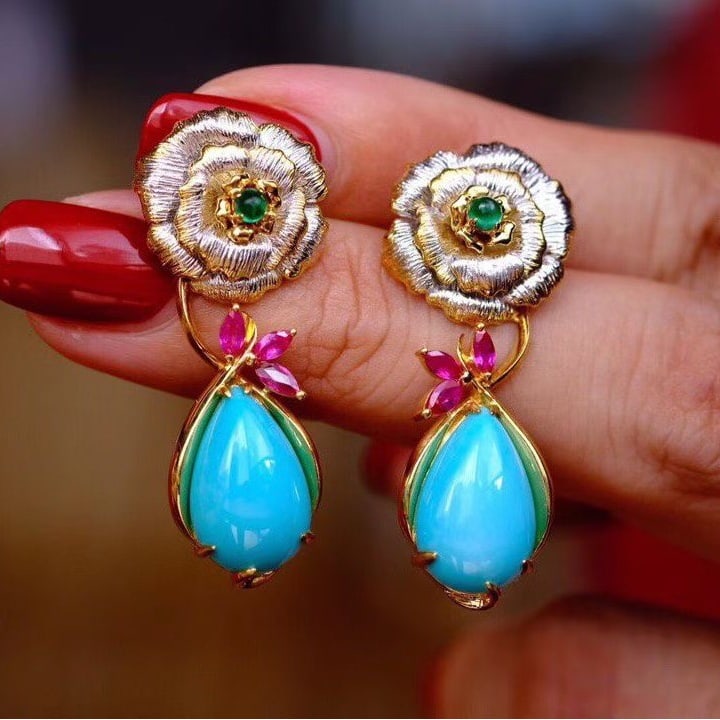 14k Gold 8 Ct Natural Turquoise & Ruby & Emerald Earrings: Ref:231067018 // gold content:14k gold // main gemstone:turquoise // number of stones:2 // shape:pear // carat weight:8ct // color:blue // treatment:natural // // adjacent gemstone 2 : ruby // number