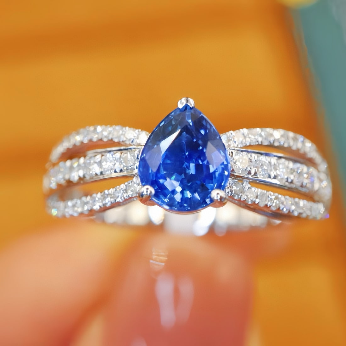14k Gold 1.34 Ctw Natural Sapphire & Diamond Ring: Ref:231067061 // gold content:14k gold // ring size:7. 25 us // // main gemstone:sapphire // shape:pear // carat weight:1. 06ct // color:blue // treatment:natural // // adjacent gemstone 2 : diamond
